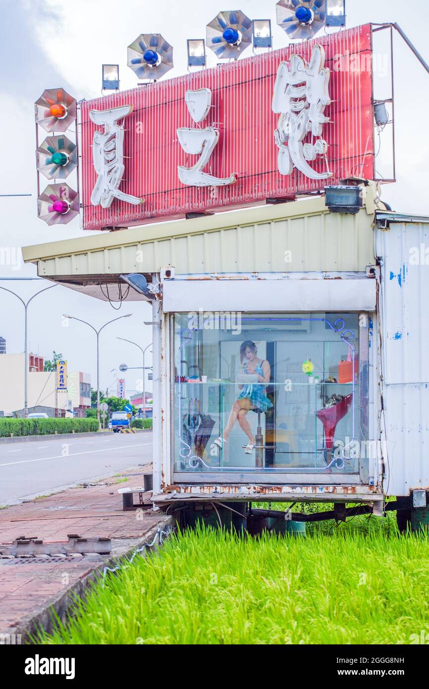 Kiosk at side of highway selling betel nut leaf from betel nut beauty (binlang girl), Taipei, Taiwan Stock Photo