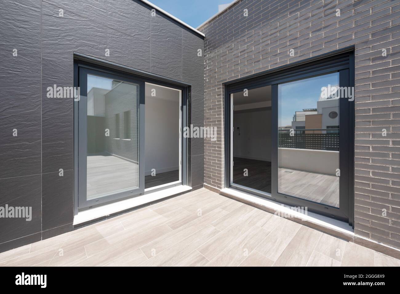 Sliding glass doors to the attic apartment from the terrace Stock Photo Alamy