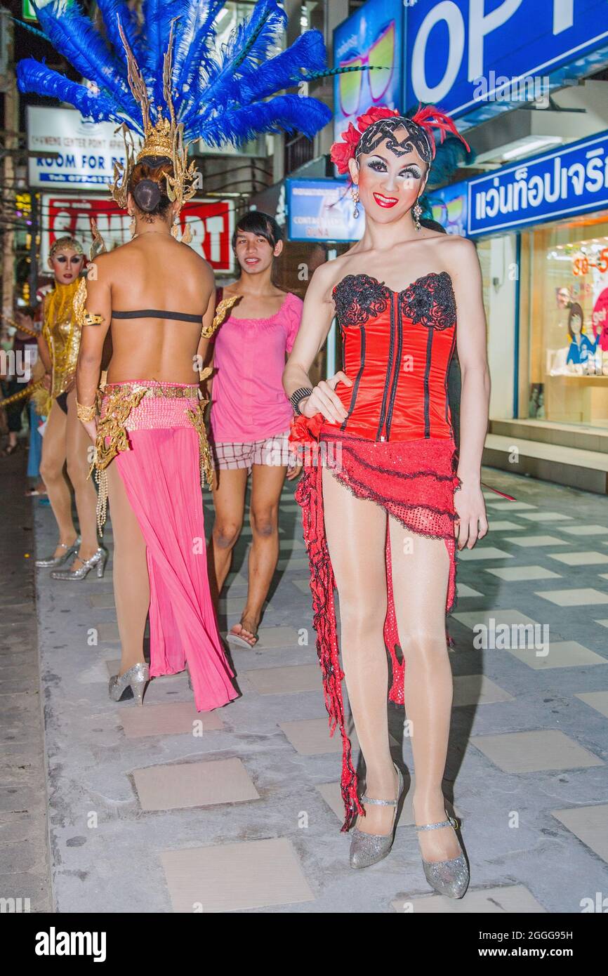 Thai Ladyboys Dressed In Sparkly Colourful Costumes With Flamboyant thai-ladyboys-dressed-in-sparkly-colourful-costumes-with-flamboyant