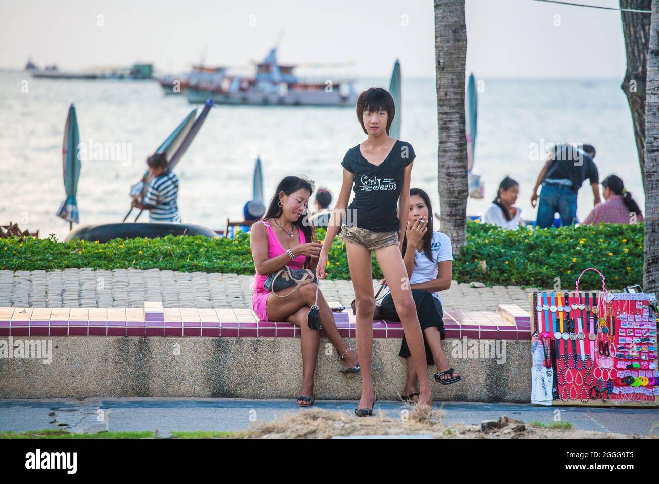 Anorexic Looking Thai Ladyboy Freelancer Worker Posing Holding anorexic-looking-thai-ladyboy-freelancer--worker-posing-holding