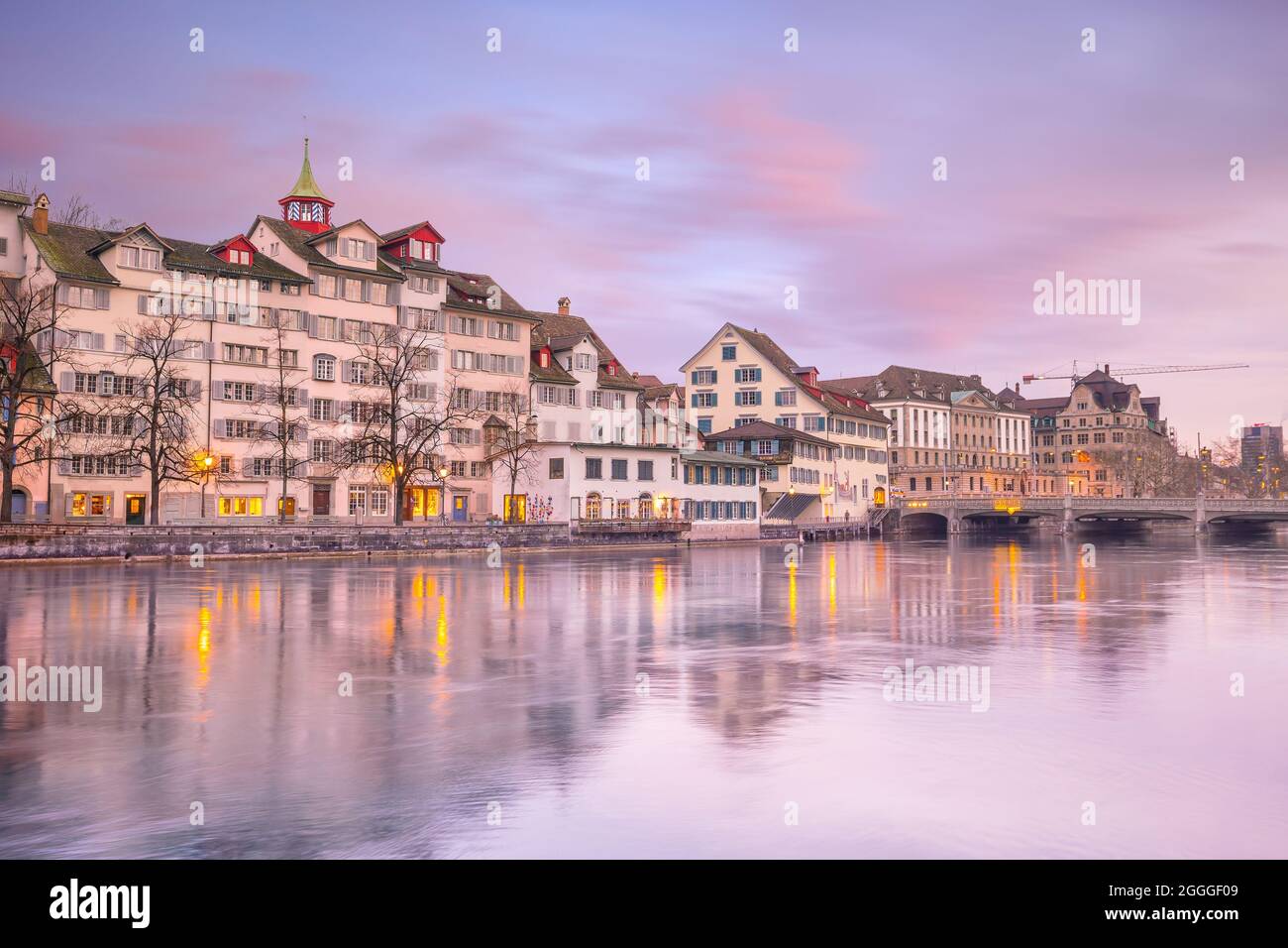 Cityscape of downtown Zurich in Switzerland during dramatic sunset. Stock Photo