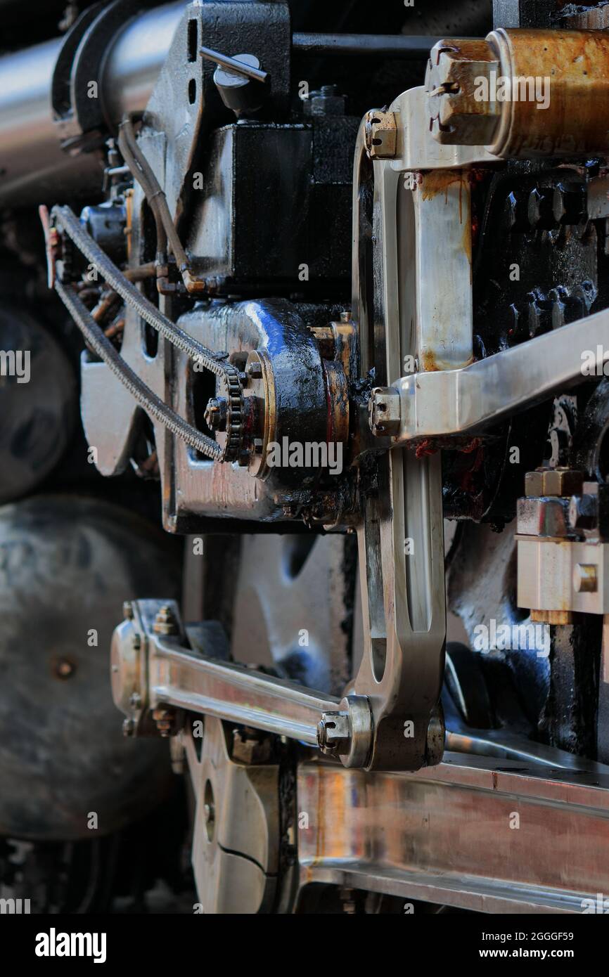 Rods that connect a steam locomotive's drive wheels to the pistons Stock Photo