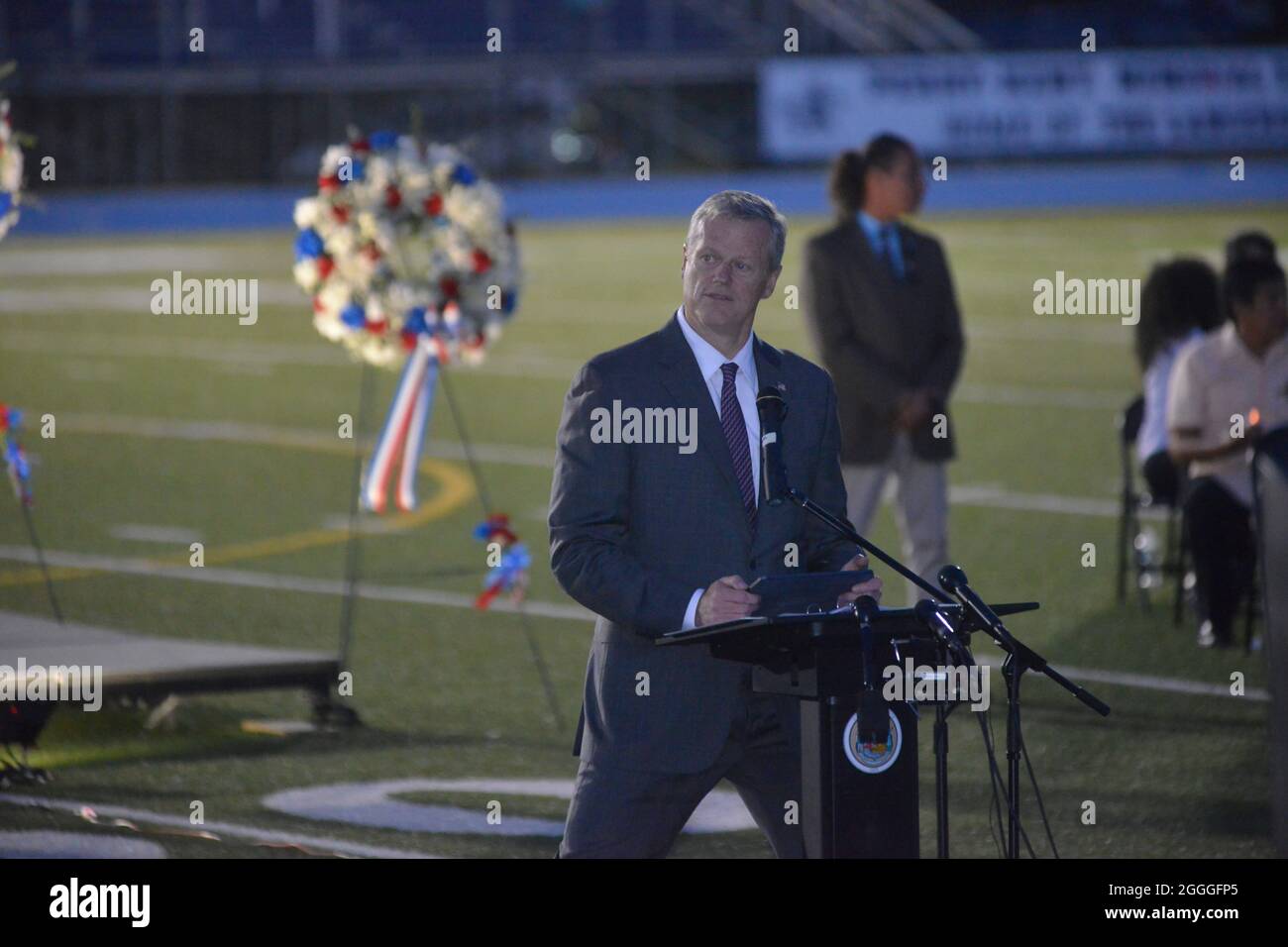 Lawrence, Massachusetts, USA. 31st Aug, 2021. Governor Charales Baker speaks to Lawrence residents gathered at Veterans Memorial Stadium to participate in a vigil for Marine Sargent Rohanny Rosario Pichardo who was killed last week by a suicide bomber during the evacuation of the United States from Kabul, Afghanistan. (Credit Image: © Kenneth Martin/ZUMA Press Wire) Stock Photo