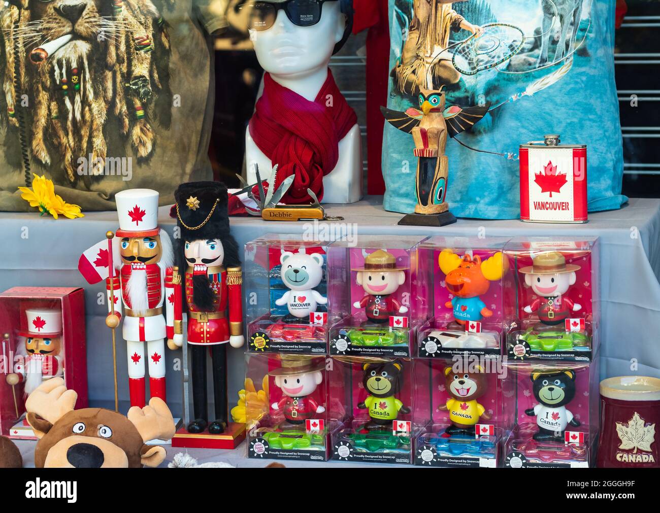 Souvenirs and toys on the display of a gift shop in Vancouver BC, Canada. July 29,2021. Street view, travel photo, selective focus. Stock Photo