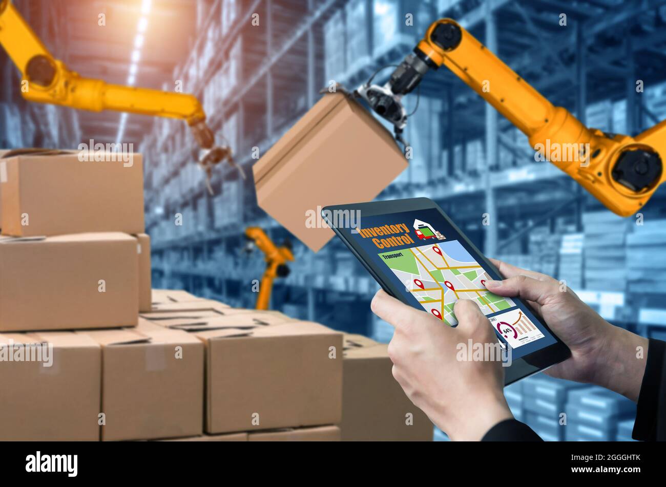 Smart robot arm systems for innovative warehouse and factory digital technology . Automation manufacturing robot controlled by industry engineering Stock Photo