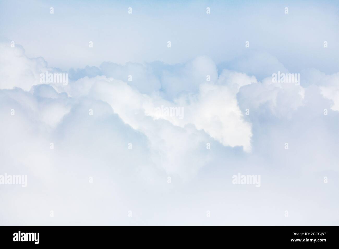 White fluffy cloud texture, big soft light blue cumulus clouds closeup, overcast sky background, beautiful cloudscape skies backdrop, cloudy heaven Stock Photo