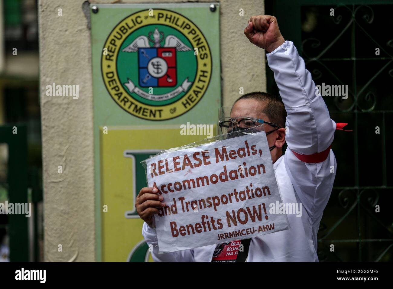 September 1, 2021: An activist wearing a protective suit holds a sign during a protest in front of the Department of Health headquarters in Manila, Philippines. September 1, 2021. Various groups demanded for the immediate release of COVID-19 funds allocated for support to healthcare workers in public and private hospitals and the resignation of Health Secretary Francisco Duque, who has been facing allegations of corruption in handling pandemic funds. (Credit Image: © Basilio Sepe/ZUMA Press Wire) Stock Photo