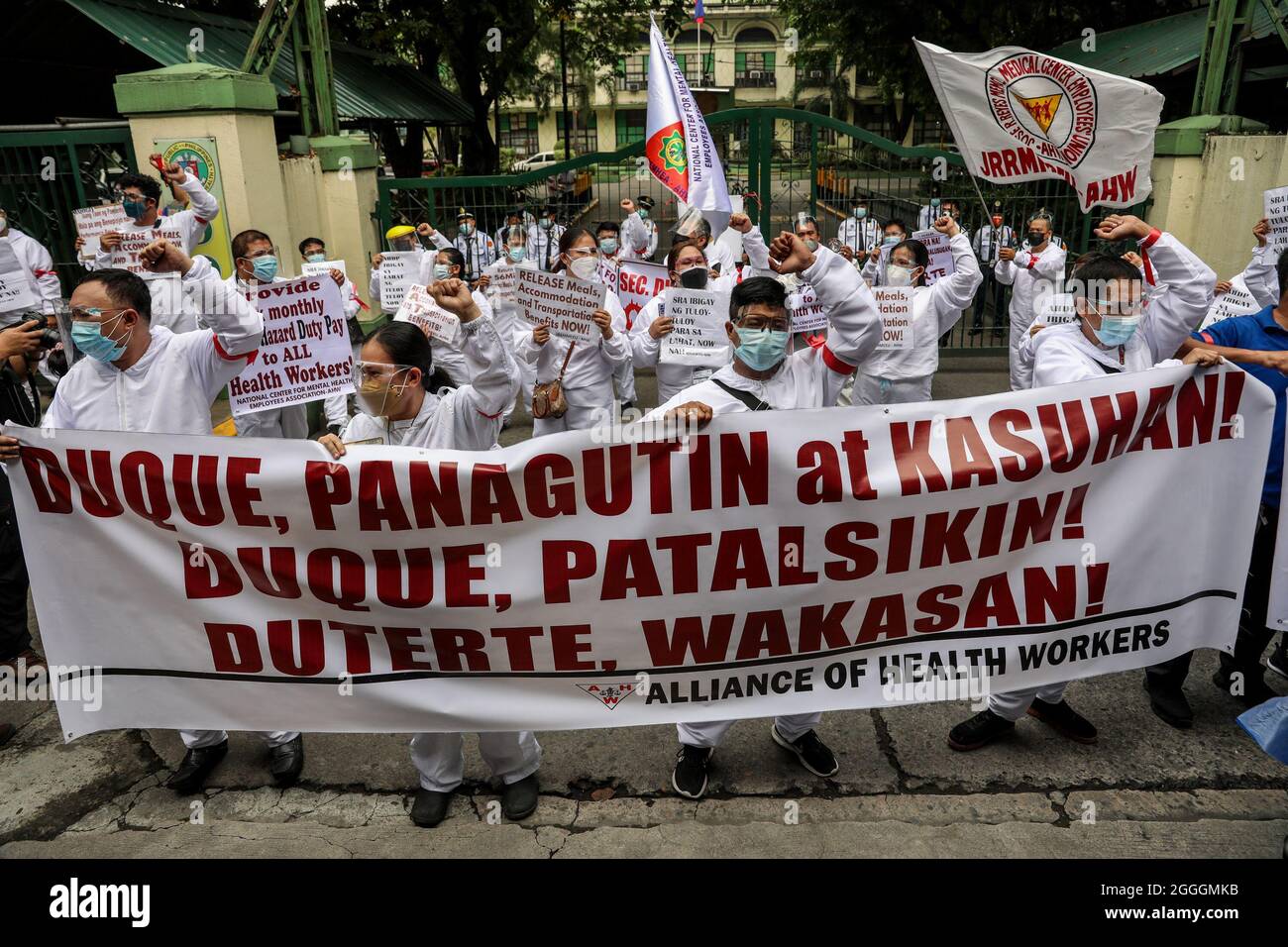 September 1, 2021: Hospital workers and health activists wearing protective suits hold signs during a protest in front of the Department of Health headquarters in Manila, Philippines. September 1, 2021. Various groups demanded for the immediate release of COVID-19 funds allocated for support to healthcare workers in public and private hospitals and the resignation of Health Secretary Francisco Duque, who has been facing allegations of corruption in handling pandemic funds. (Credit Image: © Basilio Sepe/ZUMA Press Wire) Stock Photo