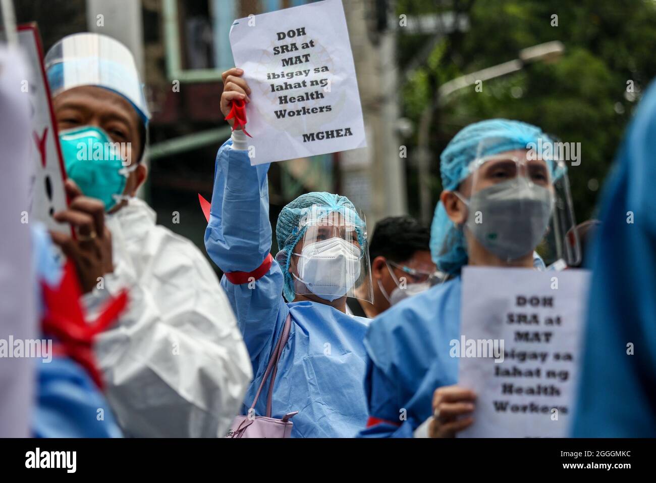 September 1, 2021: An hospital worker wearing a protective suit holds a sign during a protest in front of the Department of Health headquarters in Manila, Philippines. September 1, 2021. Various groups demanded for the immediate release of COVID-19 funds allocated for support to healthcare workers in public and private hospitals and the resignation of Health Secretary Francisco Duque, who has been facing allegations of corruption in handling pandemic funds. (Credit Image: © Basilio Sepe/ZUMA Press Wire) Stock Photo