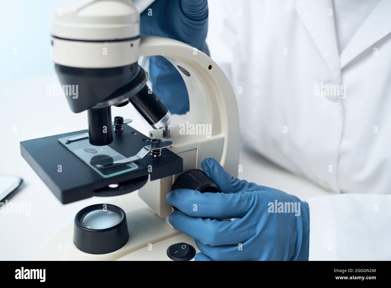 woman wearing medical mask laboratory microscope science research Stock ...
