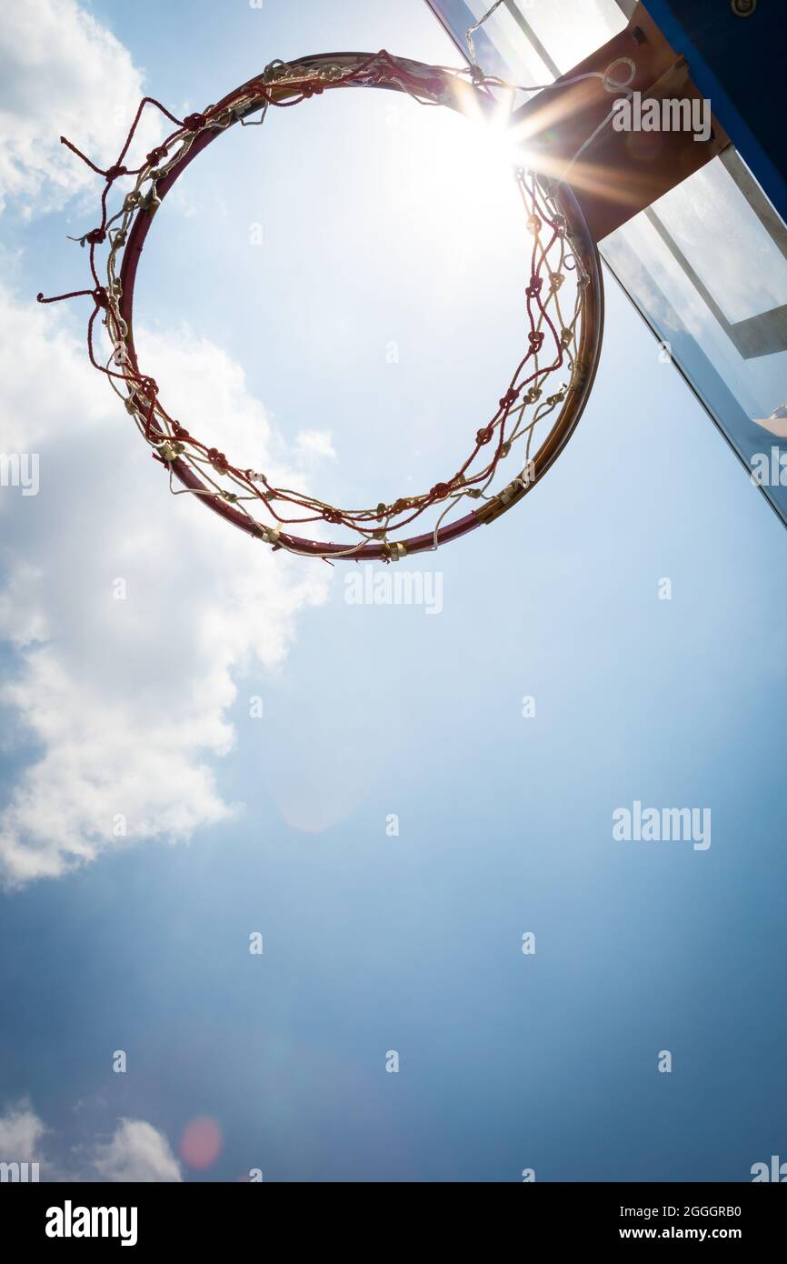 basketball hoop stand again blue sky in sunshine day Stock Photo Alamy