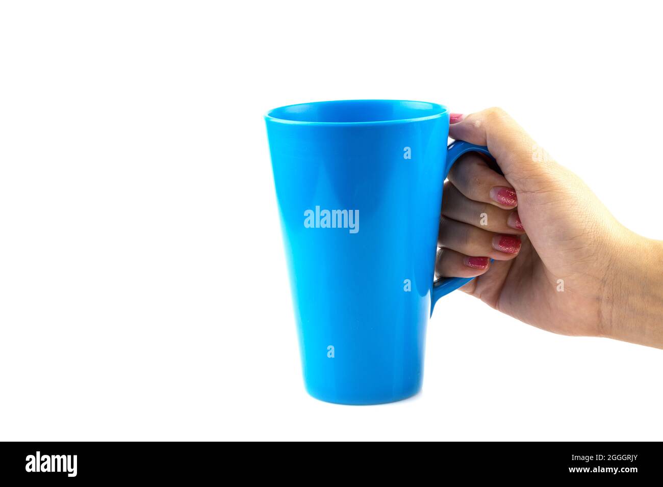 Woman Hand with blue cup of tea isolated on white background Stock Photo