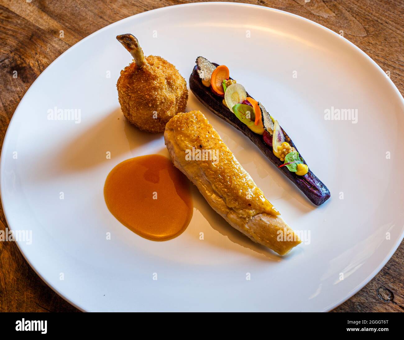 Gourmet plate at Hotel Hohenwart in Scena, Italy. Corn poulard, breast