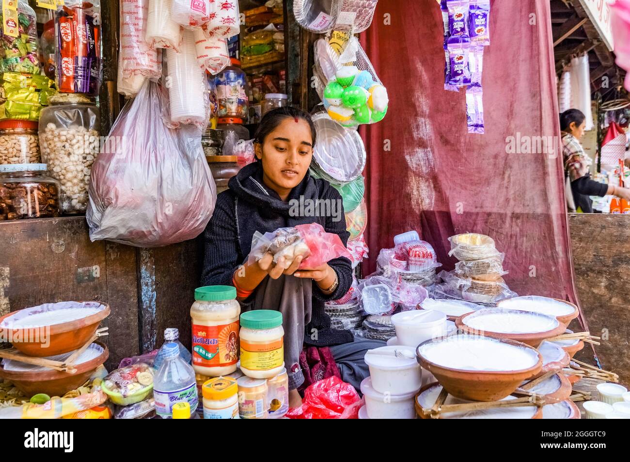 the yogurt seller, Nepalese girl selling yogurt and dairy products in a