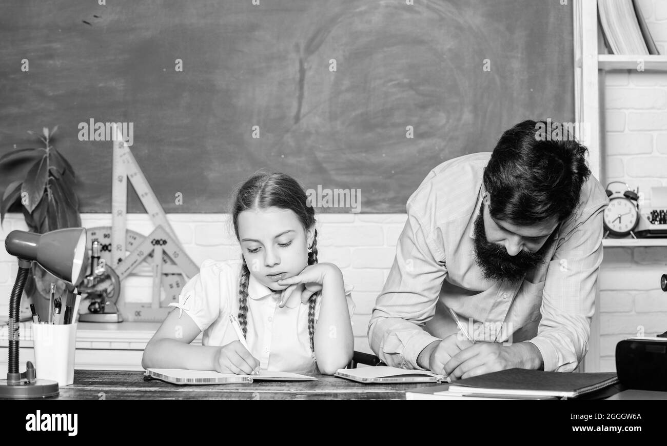 Early development of children. daughter study with father. Teachers day