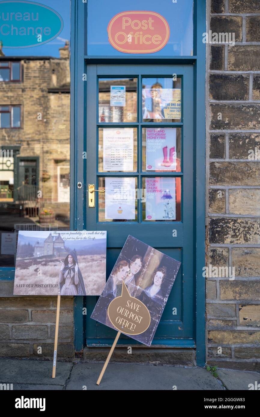 August 2021, Haworth, West Yorkshire, signs of the protest by local residents over the proposed closure of the sub post office causing concern Stock Photo