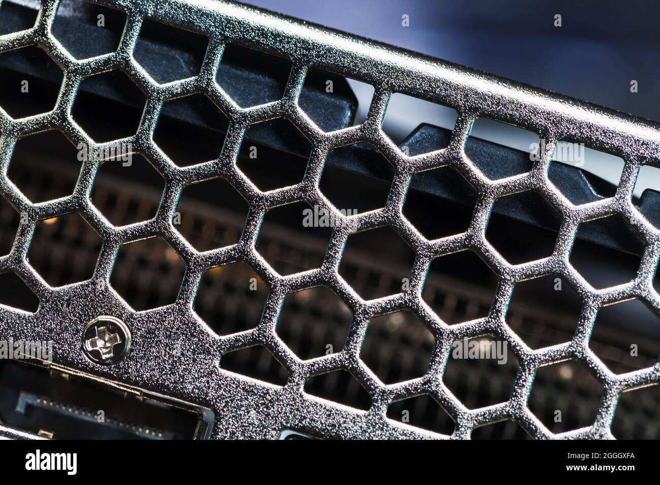 New shiny black PC ventilation grille, abstract close-up photo with selective focus Stock Photo