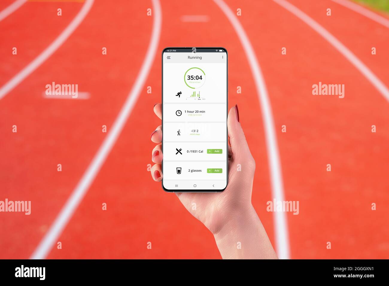 Running app interface on smart phone in woman hjand. Running steps counter with health analytics. Athletic track in the background Stock Photo