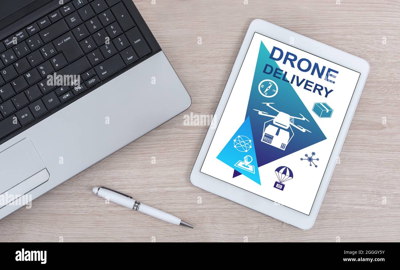 Drone delivery concept shown on a digital tablet Stock Photo