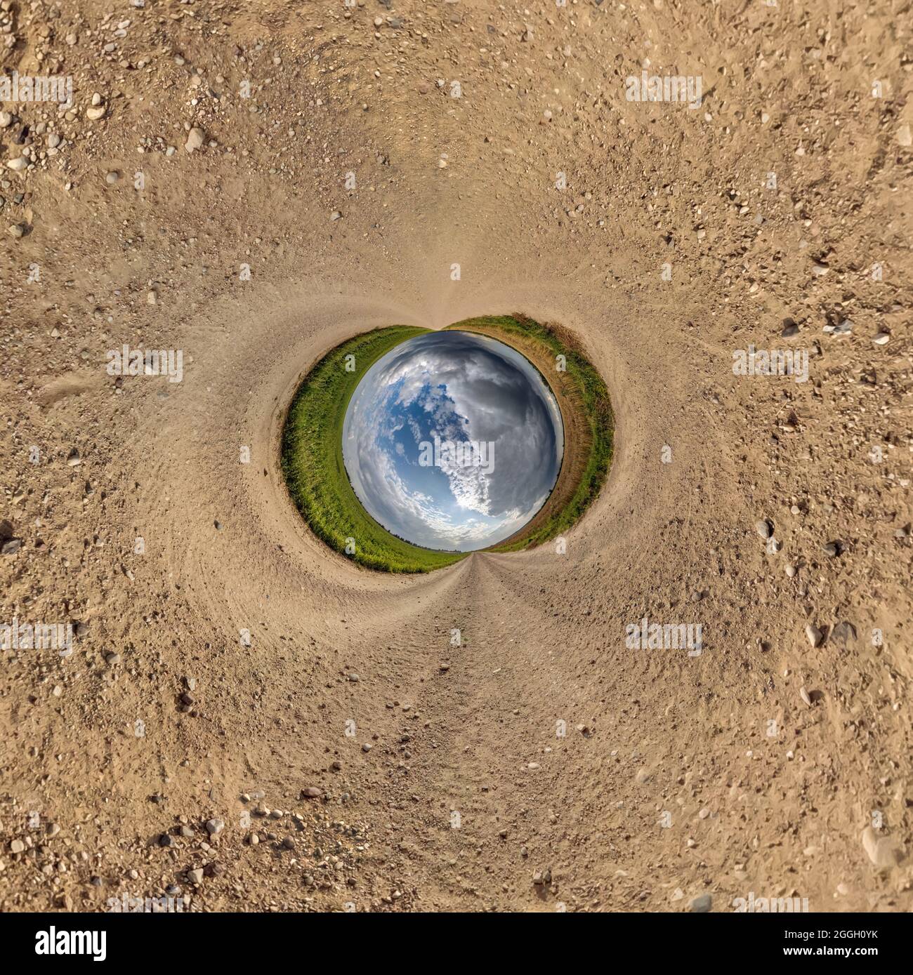 blue sphere little planet inside gravel road or field background Stock ...