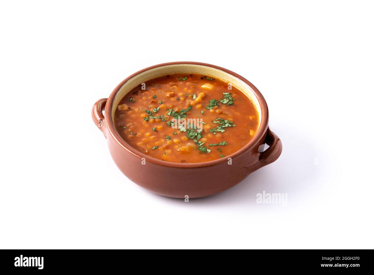 Red lentil soup isolated on white background Stock Photo