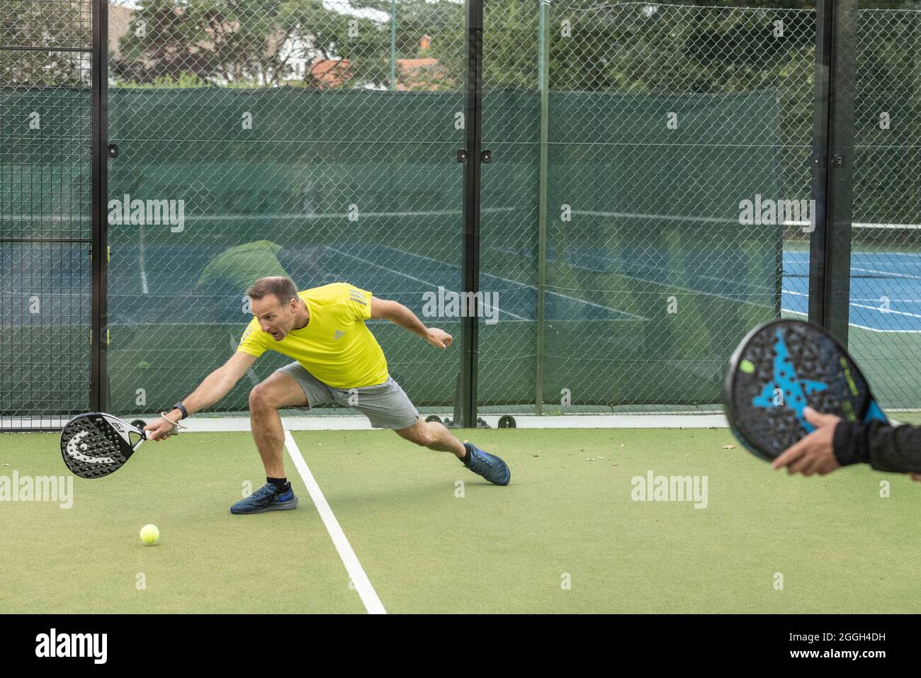 Members of the Ashtead Tennis and Squash Club playing Padel tennis. 27th August 2021 Ashtead, Surrey, UK Stock Photo