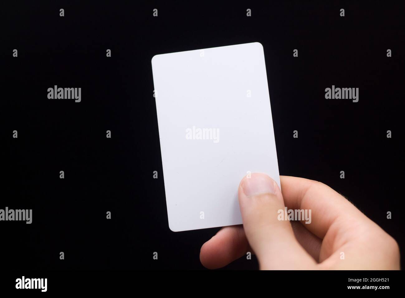 Hand holding blank business card Stock Photo - Alamy