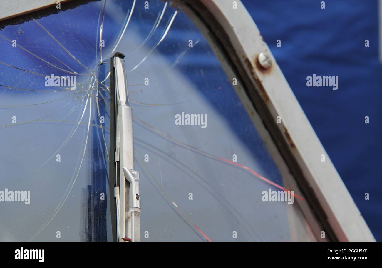 A Broken Smashed Windscreen on an Old Vintage Car. Stock Photo