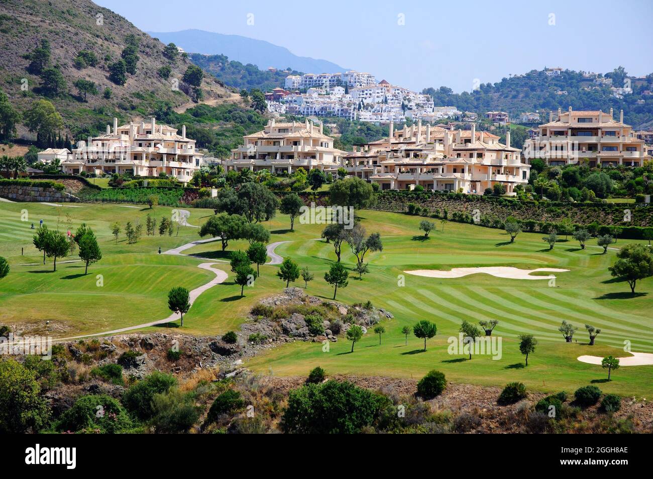 View across El Higueral Golf Course towards the mountains, Benahavis, Spain. Stock Photo