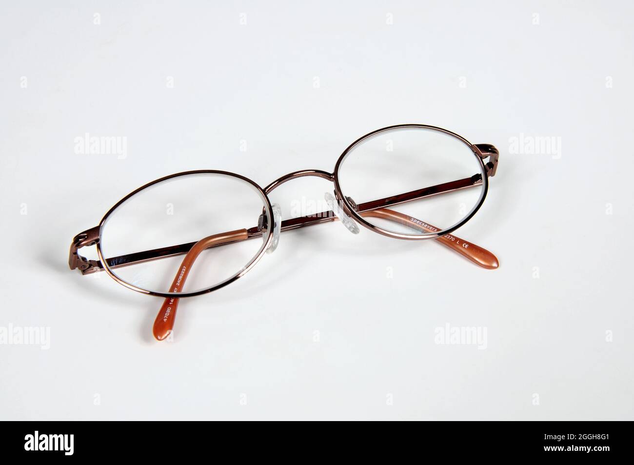 Women's glasses against a plain background Stock Photo