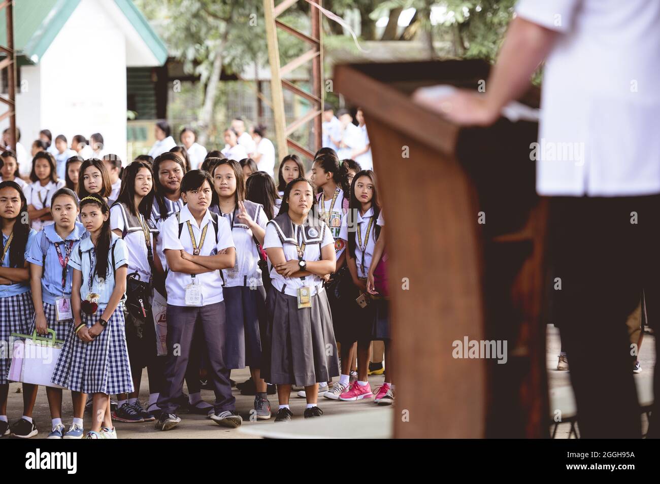 BACOLOD, PHILIPPINES - Mar 01, 2019: A group of Filipino high school students gathering for a corporate speech Stock Photo