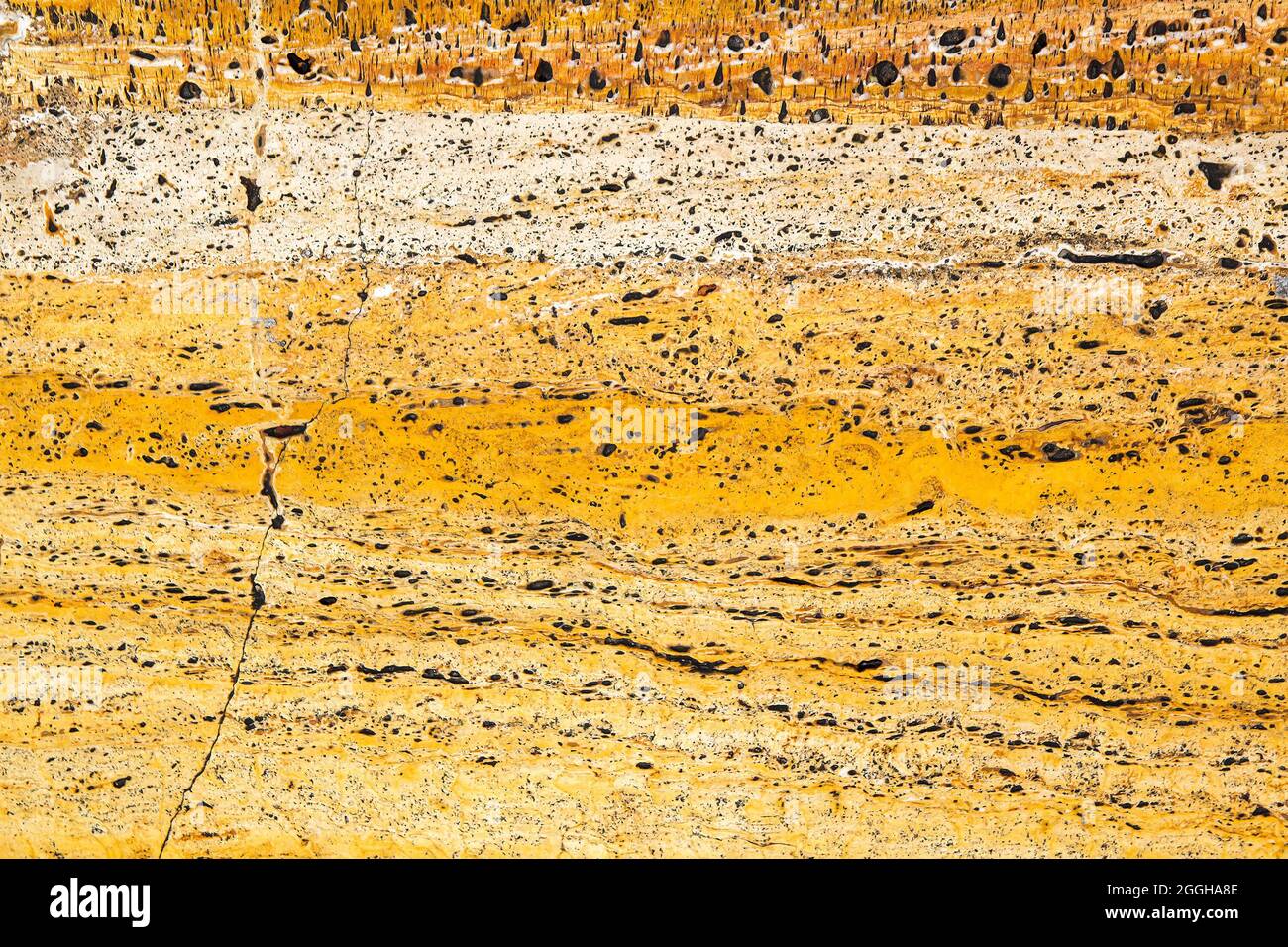 Detail of yellow travertine marble tile texture Stock Photo