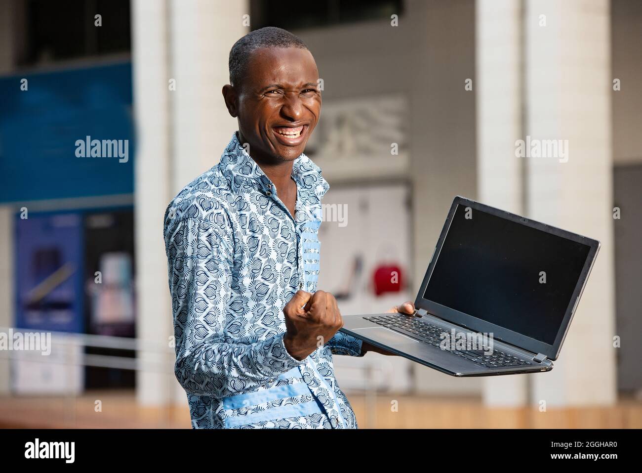 Positive african man making hi-res stock photography and images - Alamy