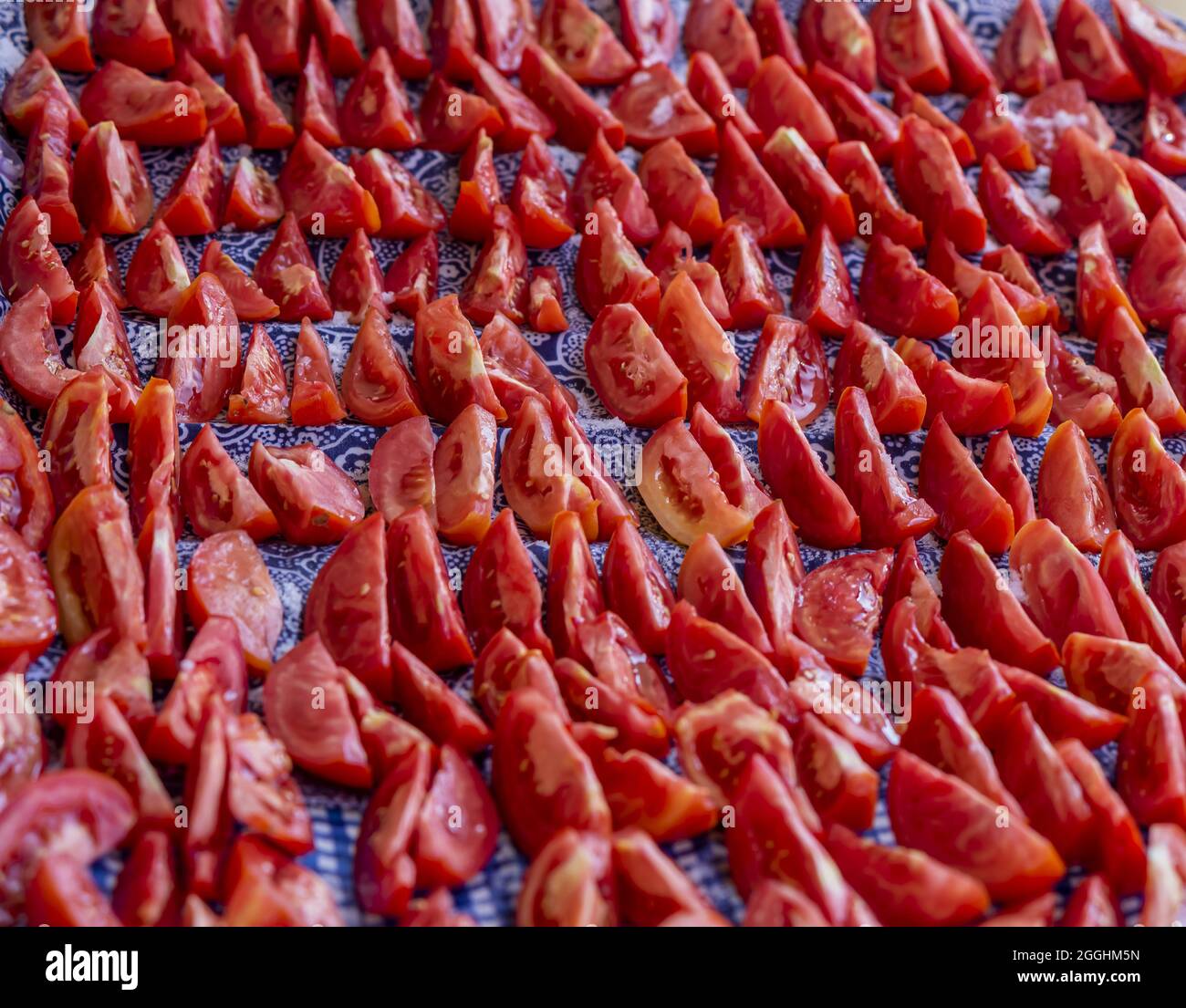 Dried tomato halves, top view, different shapes and sizes Stock Photo