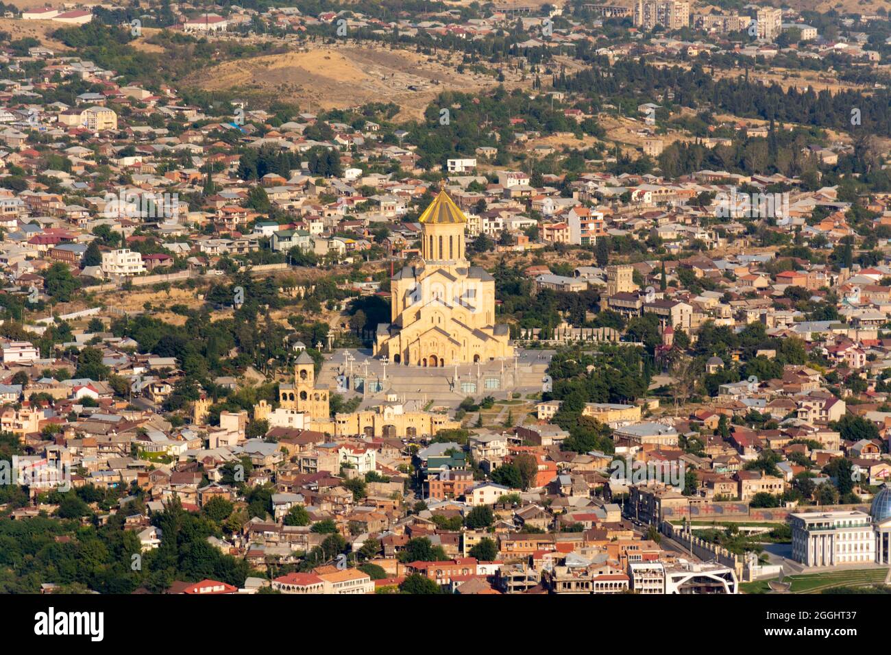 View of the Tsminda Sameba Cathedral also known as the Holy Trinity Cathedral in the capital city of Tbilisi in Georgia. Stock Photo