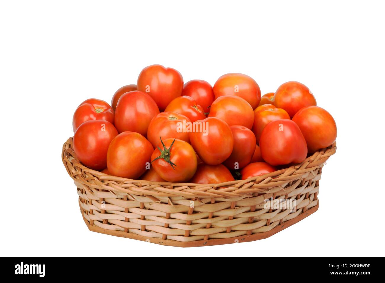 tomatoes in wicker basket on isolated white background Stock Photo - Alamy