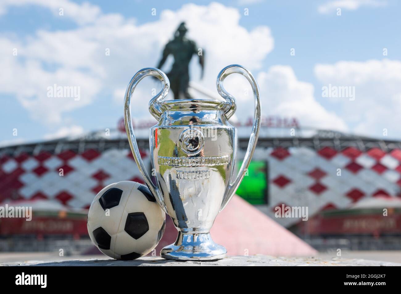 June 14, 2021 Moscow, Russia, UEFA Champions League Cup in front of a modern stadium. Stock Photo