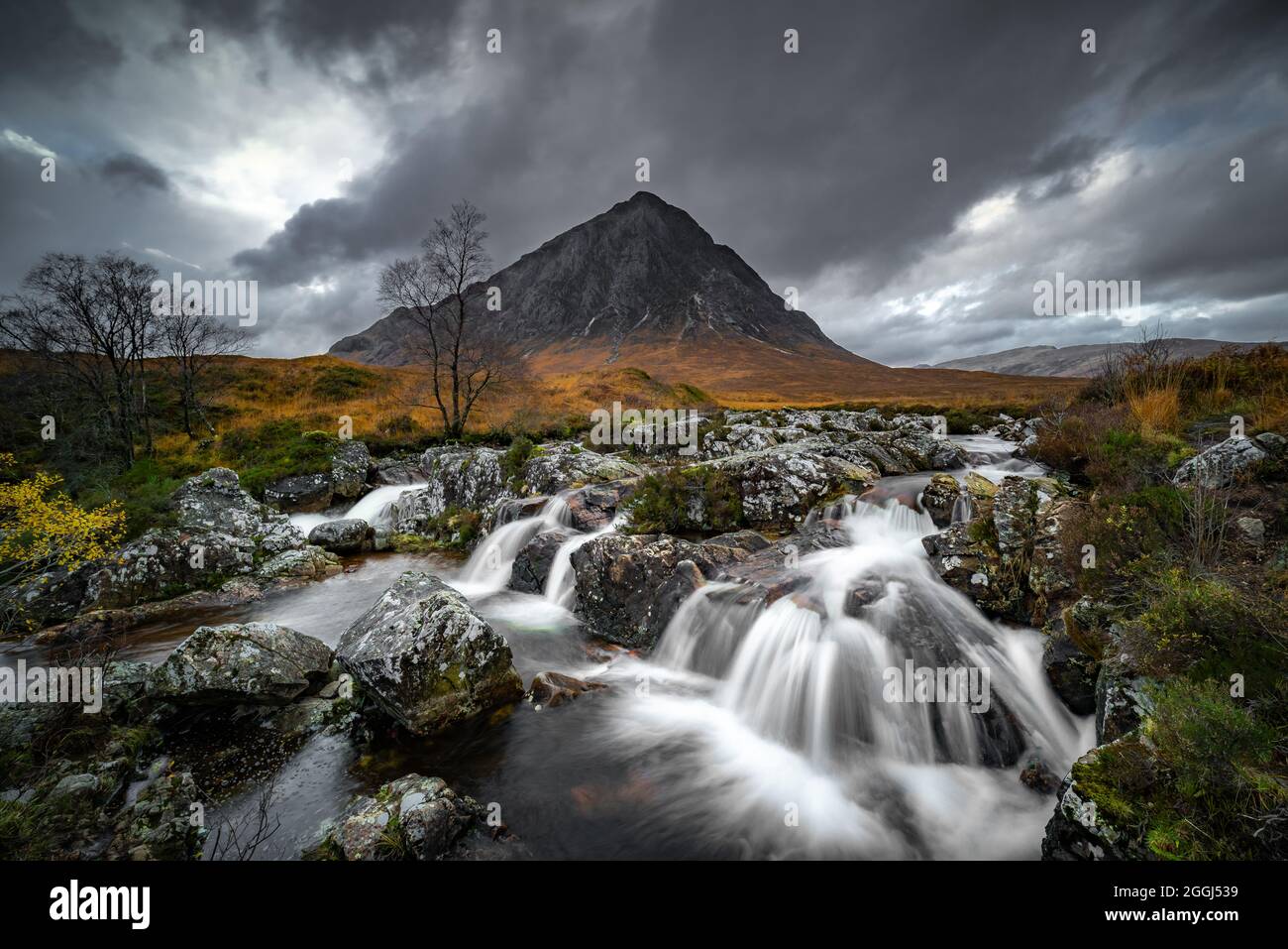 beautiful photograph of a waterfall in the mountains Stock Photo - Alamy