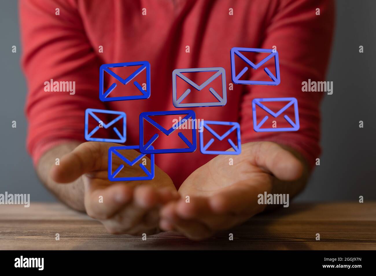 Male's hands holding an illustration of the email inbox icons Stock ...