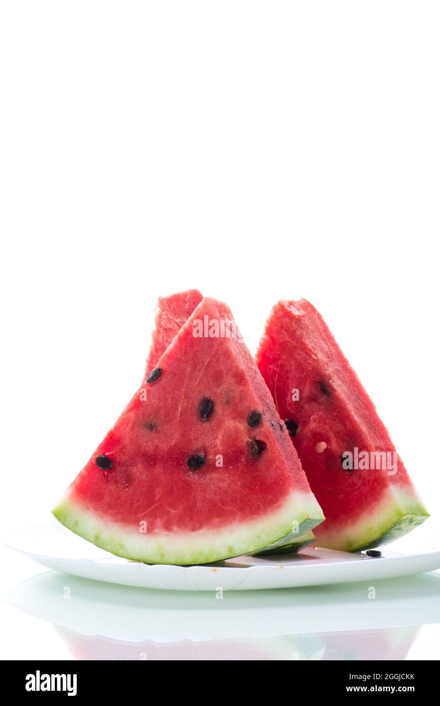 pieces of fresh ripe red watermelon on white background Stock Photo - Alamy