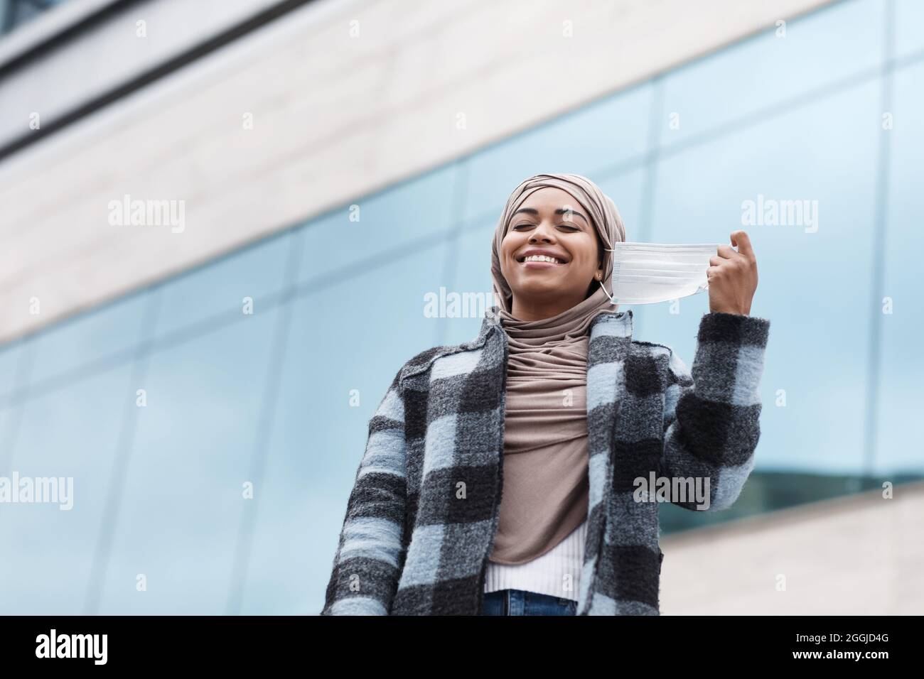 Removing mask hi-res stock photography and images - Alamy