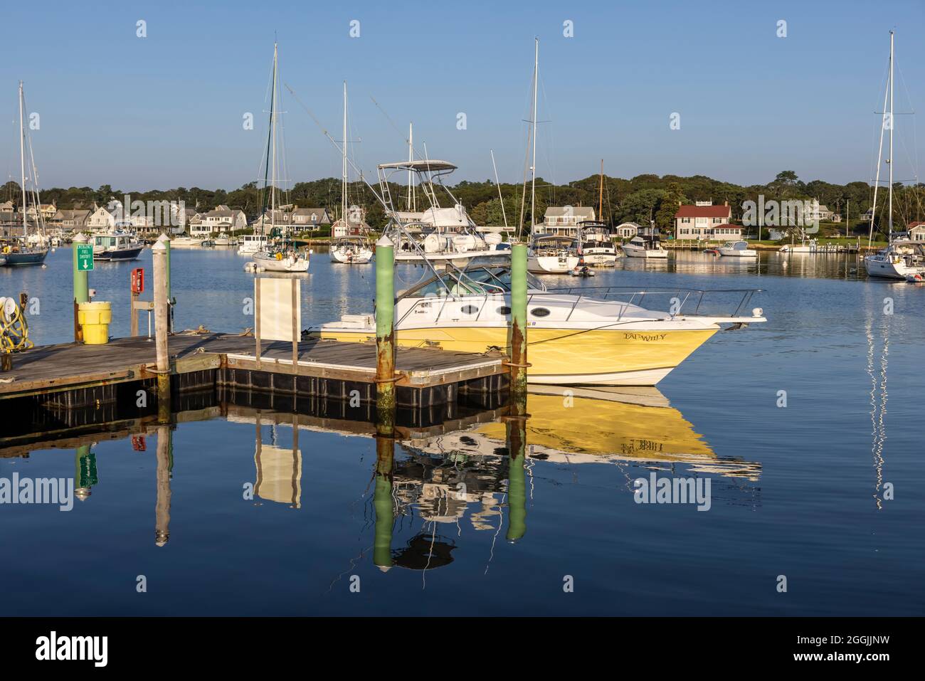A fishing charter boat docked in Oak Bluffs harbor in Oak Bluffs, Massachusetts on Martha's Vineyard. Stock Photo