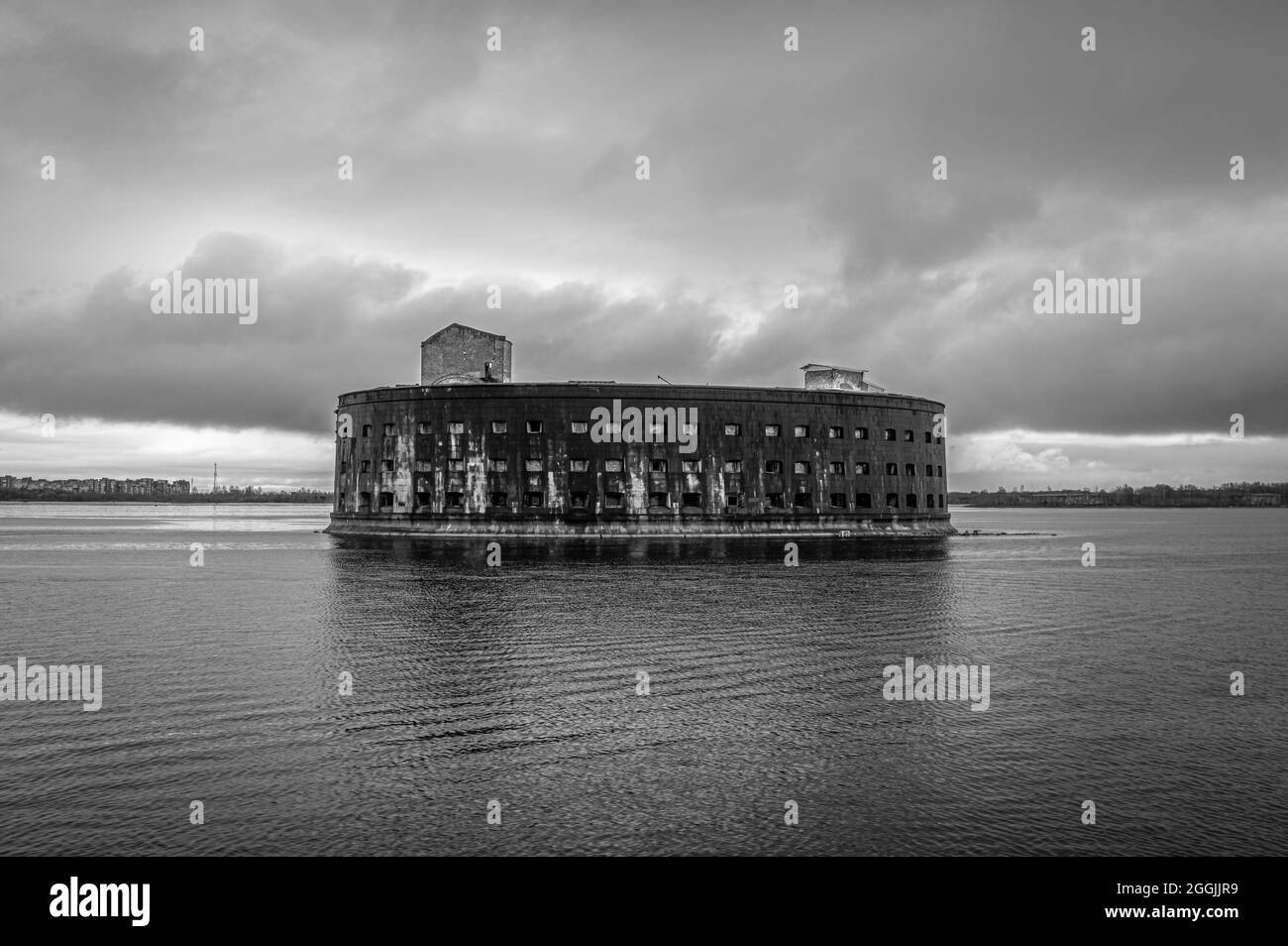 Naval fortress on an artificial island in the Gulf of Finland near the city of Kronstadt. Fort Alexander / Plague fort. Black and white. Stock Photo