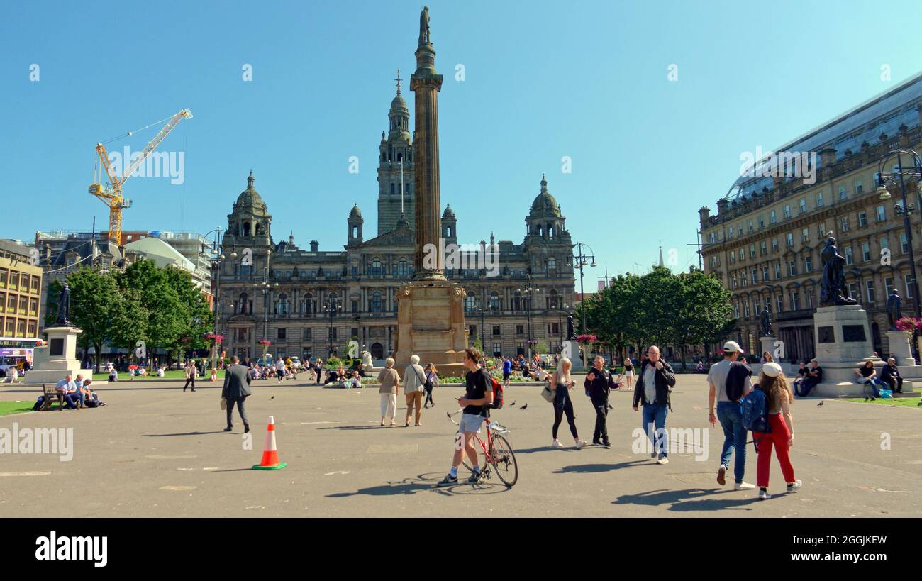 Glasgow, Scotland, UK, 1st September, 2021. UK  Weather: Sunny  weather change for the better over the city centre as covid lockdown is reviewed.  George square saw sunworshippers and people watchers as locals and tourists flocked to the city centre. Credit: Gerard Ferry/Alamy Live News Stock Photo