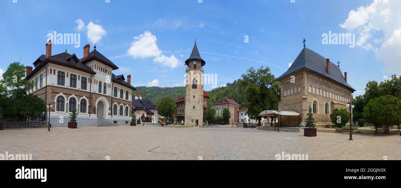 Museum of Arts, Stephen the Great's Tower and Royal Court's Birth of Saint John the Baptist Church in the Central Plaza of Piatra Neamt. Stock Photo