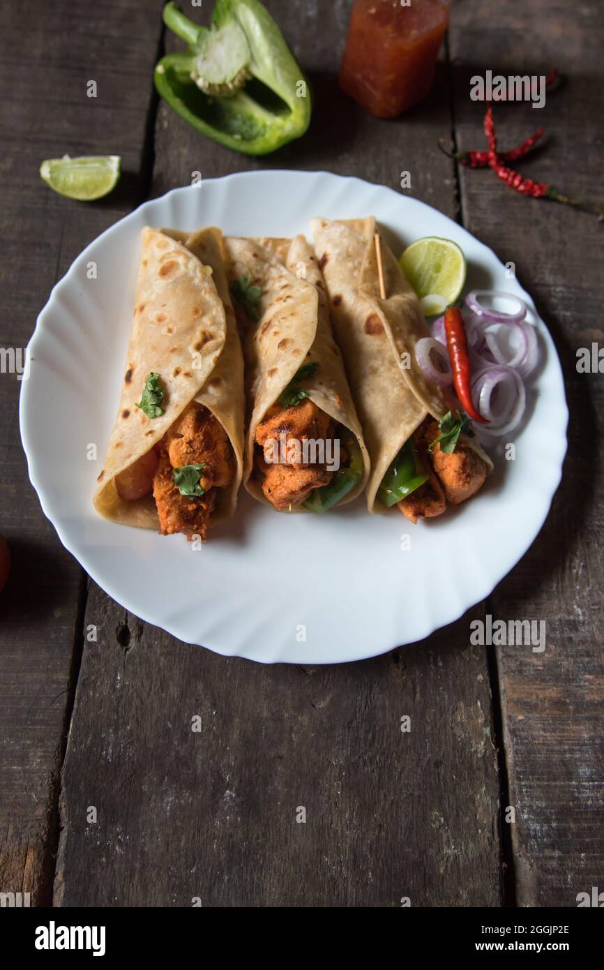 Ready to eat Burrito or tortilla meat wraps served. Top view. It is