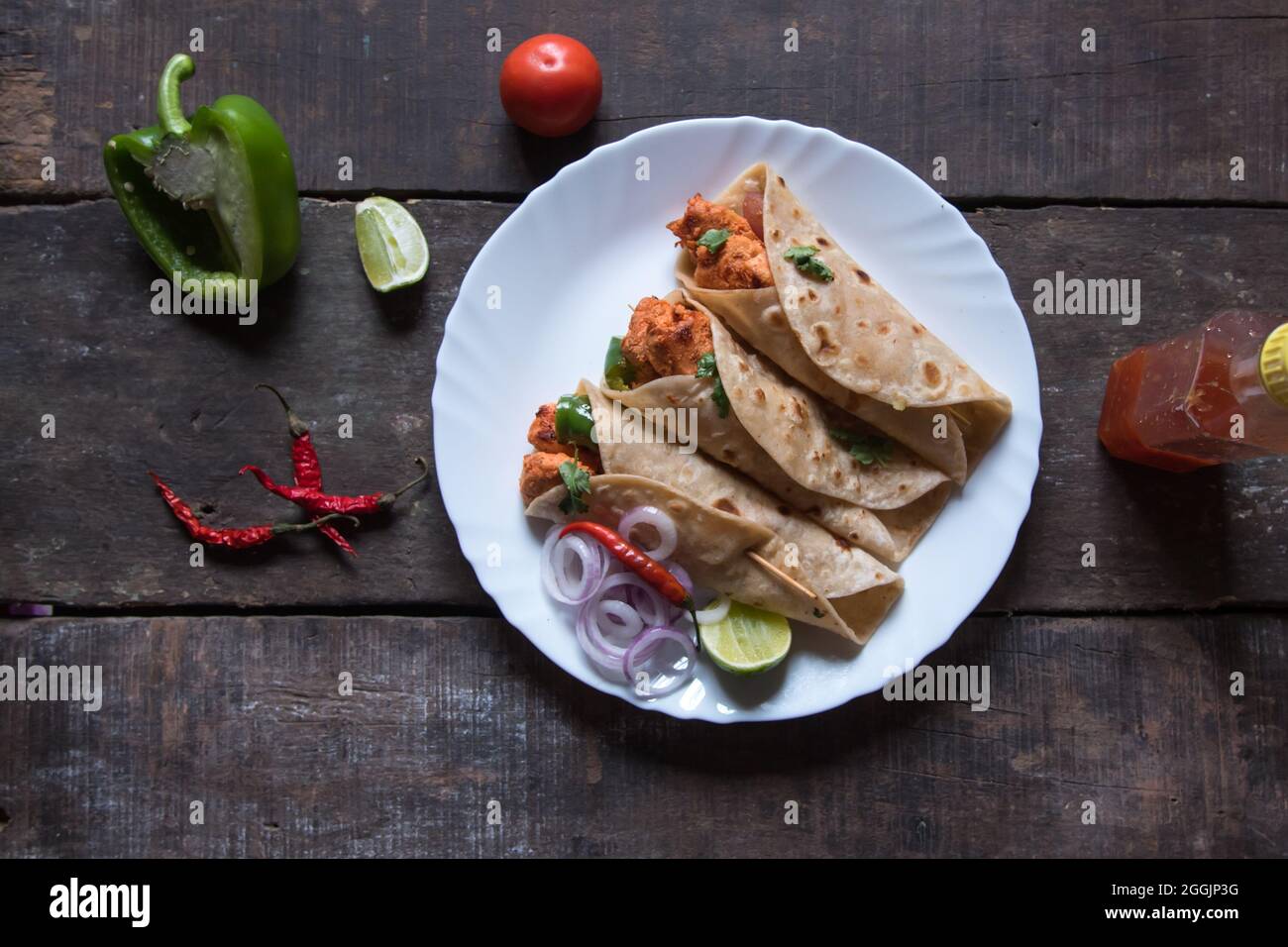 Ready to eat Burrito or tortilla meat wraps served. Top view. It is