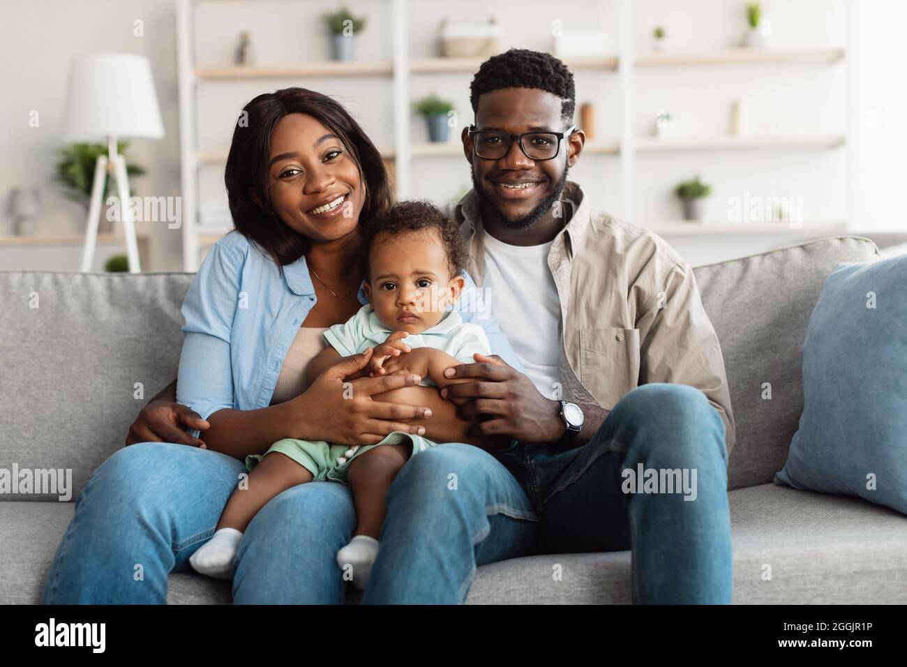 Portrait of happy black family smiling at home Stock Photo - Alamy