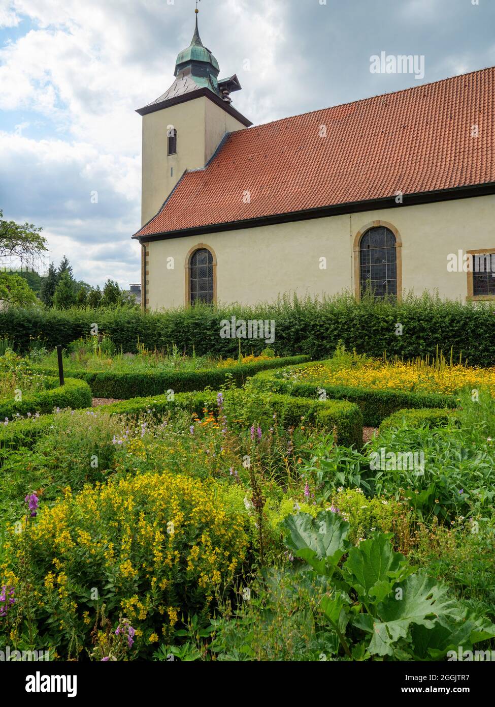 Cottage garden at the Christ Church, Belm, Osnabrück, Osnabrücker Land, Lower Saxony, Germany Stock Photo