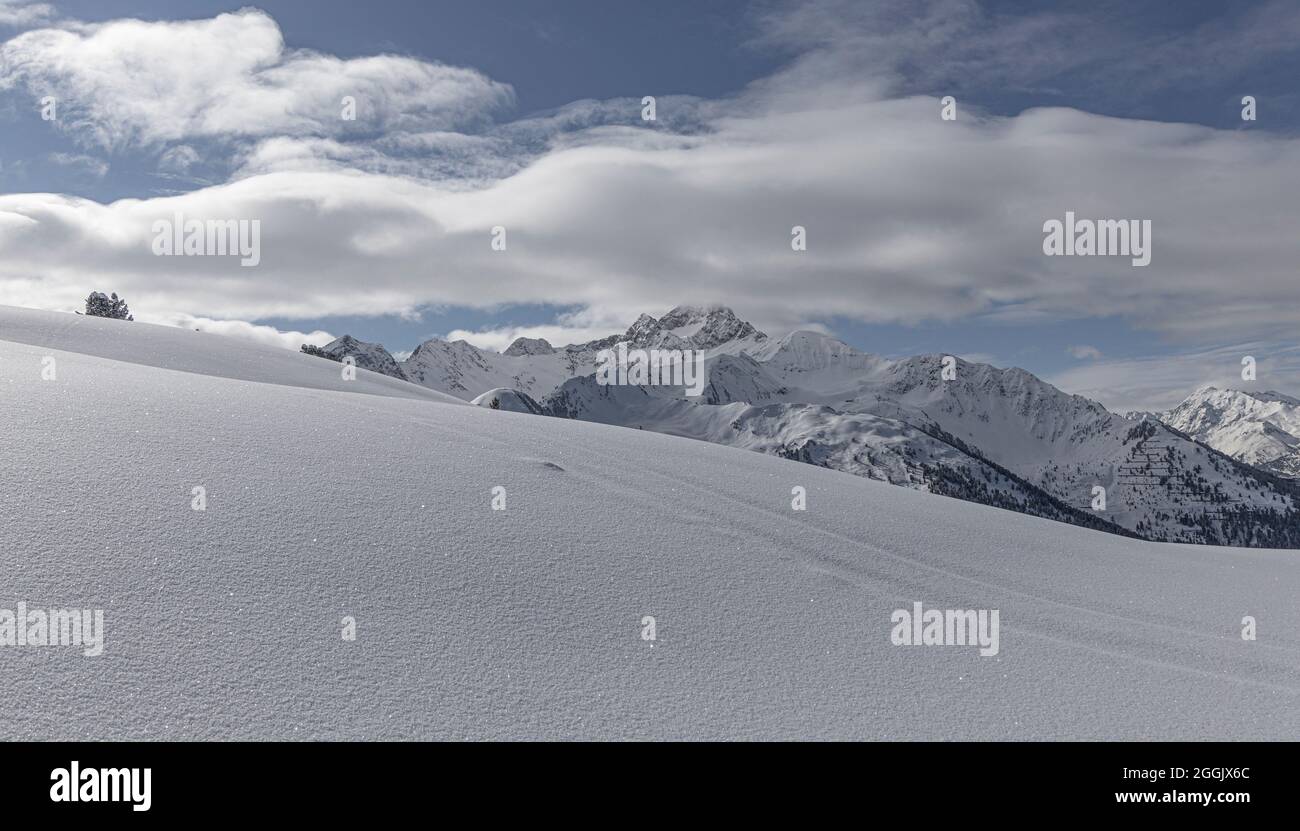 Acherkogel in Tyrol behind an untouched winter landscape Stock Photo